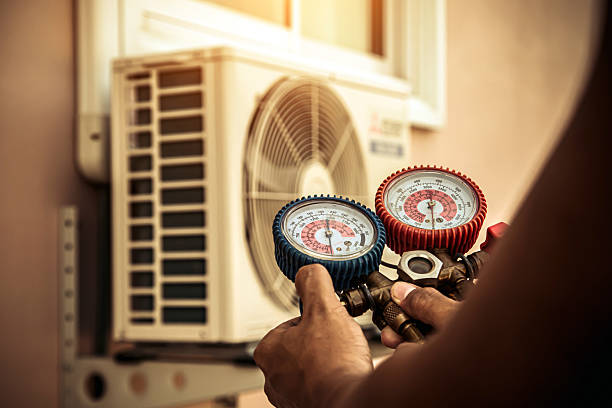 Professional Air Conditioning Service technician working in Hallsville, TX